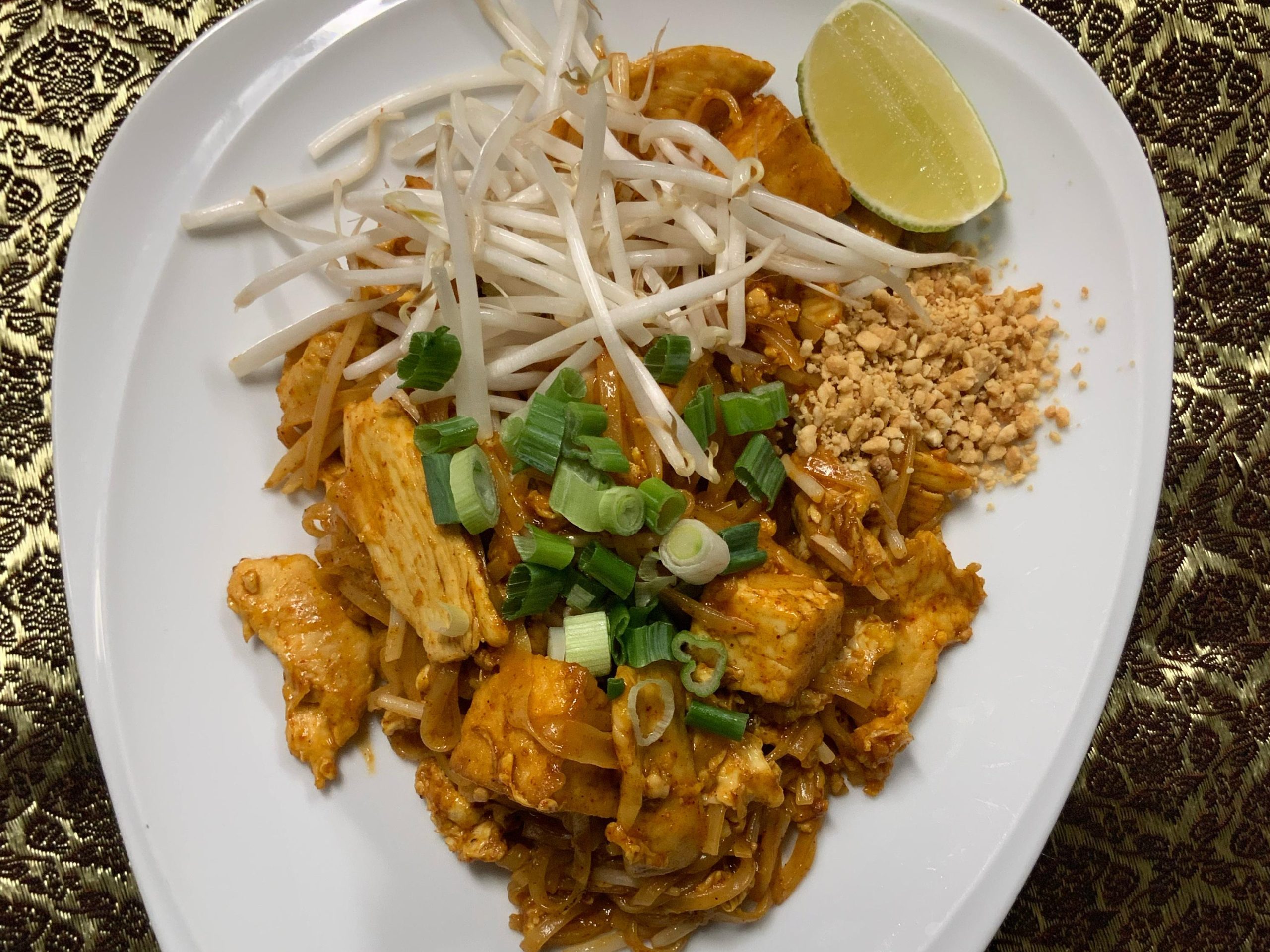 Classic chicken Pad Thai with bean sprouts, peanuts, lime, and scallions at Tora Sushi, a Asian Fusion Restaurant in Media