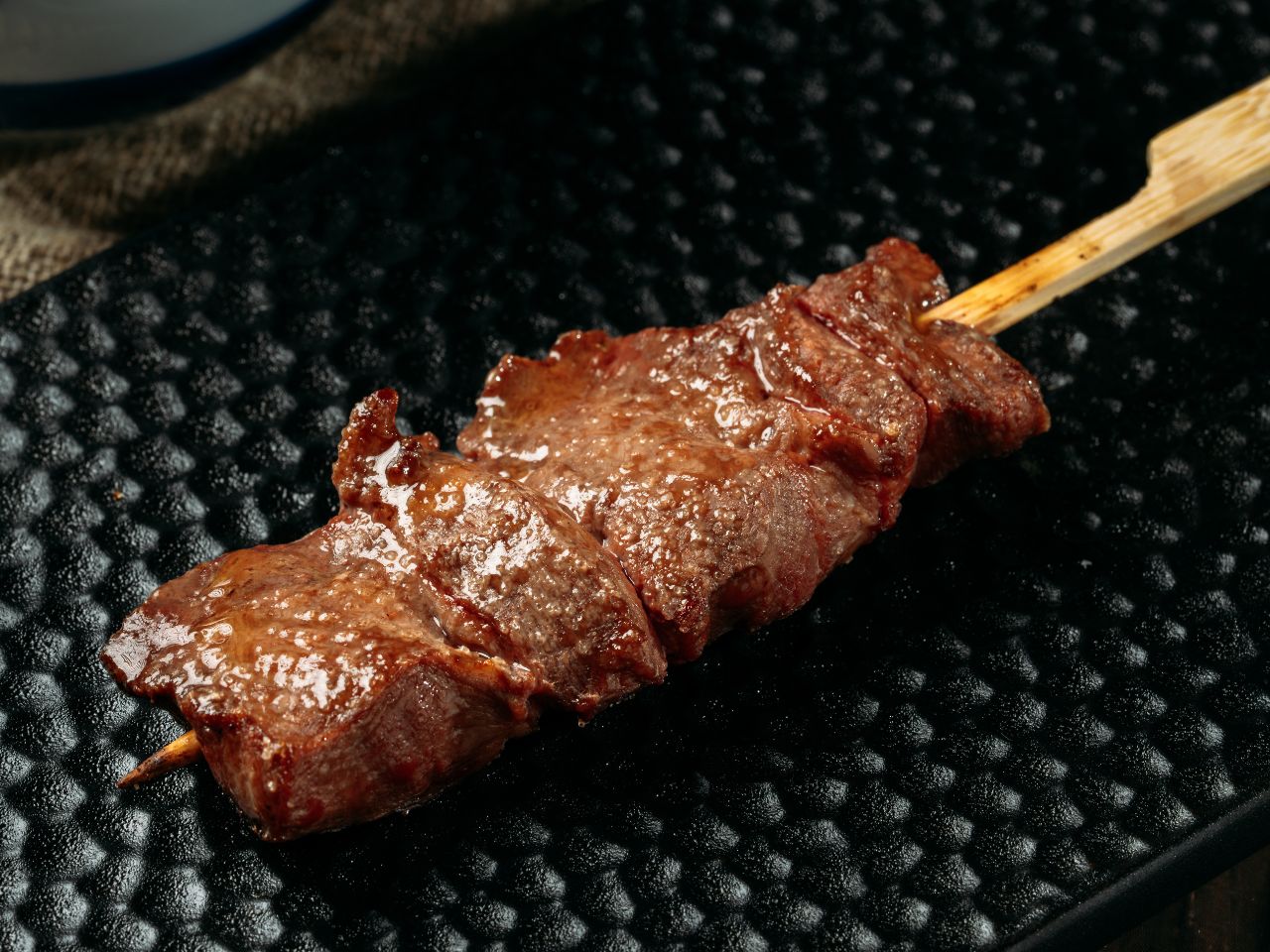 Tender grilled beef tongue skewer at Tosakko Ramen & Yakitori, a Japanese Restaurant in Pasadena