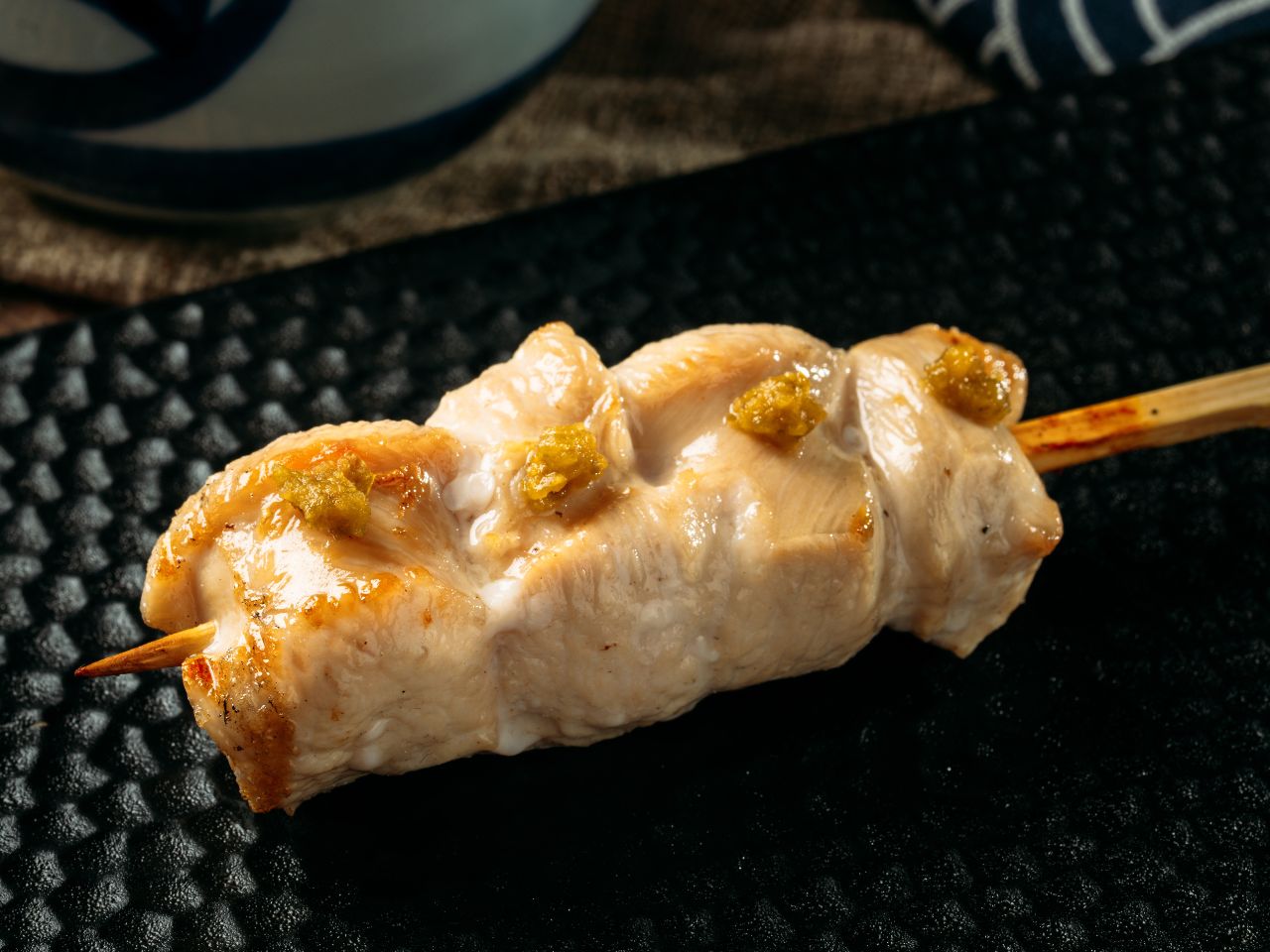 Chicken breast skewer tossed in yuzu kosho at Tosakko Ramen & Yakitori, a Japanese Restaurant in Pasadena