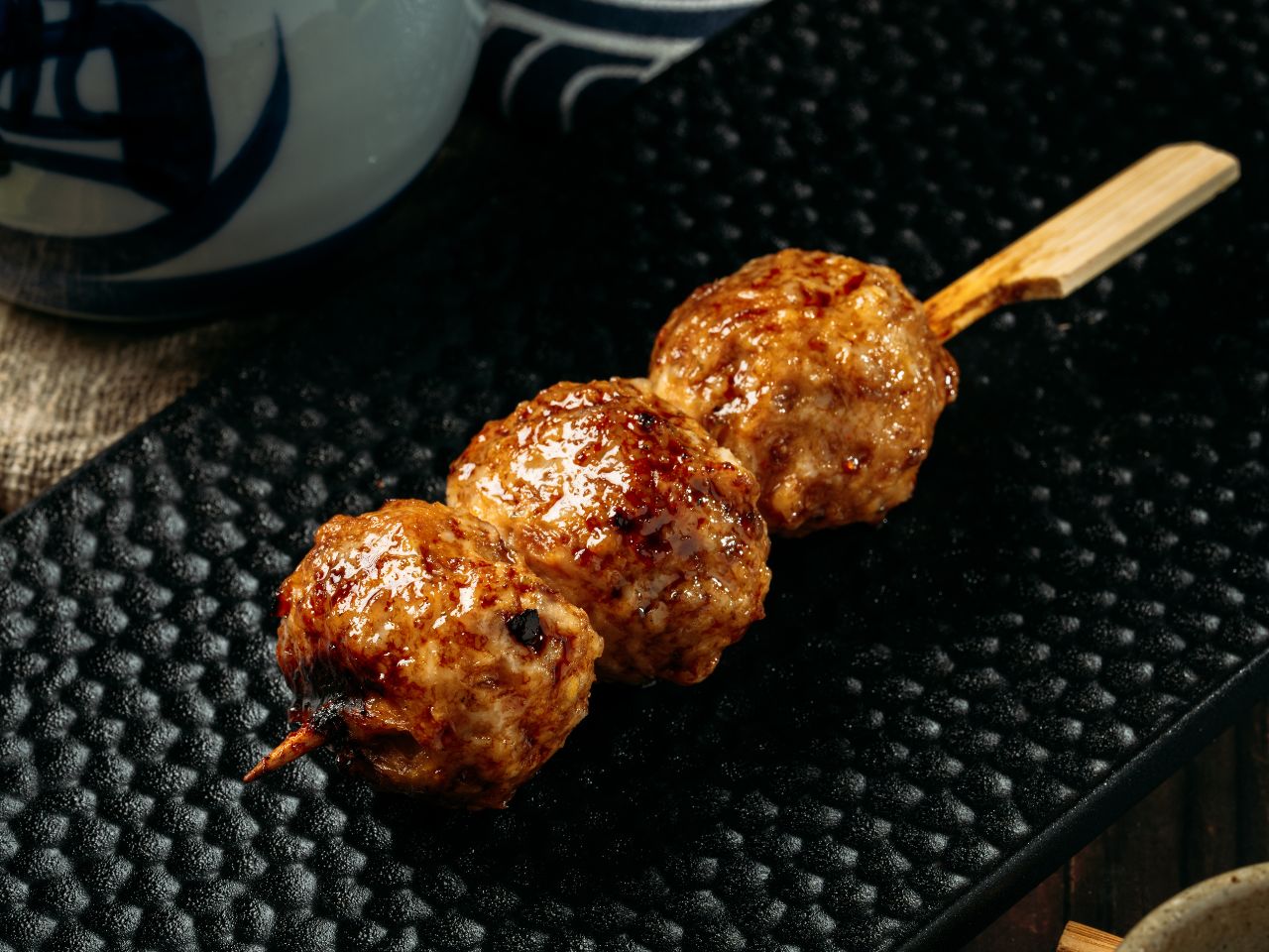 Juicy grilled chicken meatball skewer at Tosakko Ramen & Yakitori, a Japanese Restaurant in Pasadena