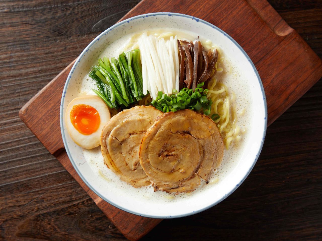 Creamy chicken paitan ramen with chashu and egg at Tosakko Ramen & Yakitori, a Japanese Restaurant in Pasadena