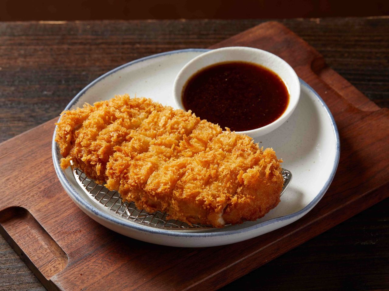 Crispy thick-cut pork cutlet with sauce at Tosakko Ramen & Yakitori, a Japanese Restaurant in Pasadena