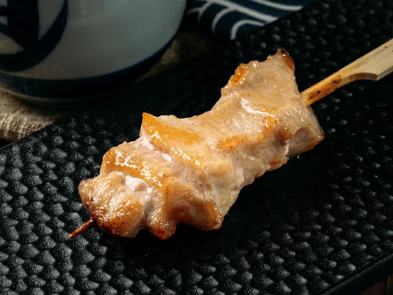 Tender grilled pork jowl skewer at Tosakko Ramen & Yakitori, a Japanese Restaurant in Pasadena