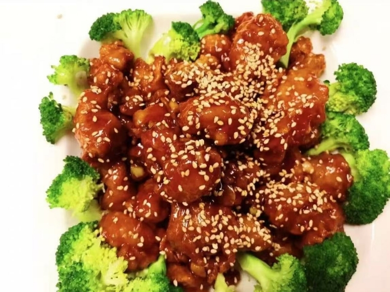 Chicken pieces coated in sweet sauce, sprinkled with sesame seeds at Town East Asian Buffet, a Self service restaurant in Mesquite