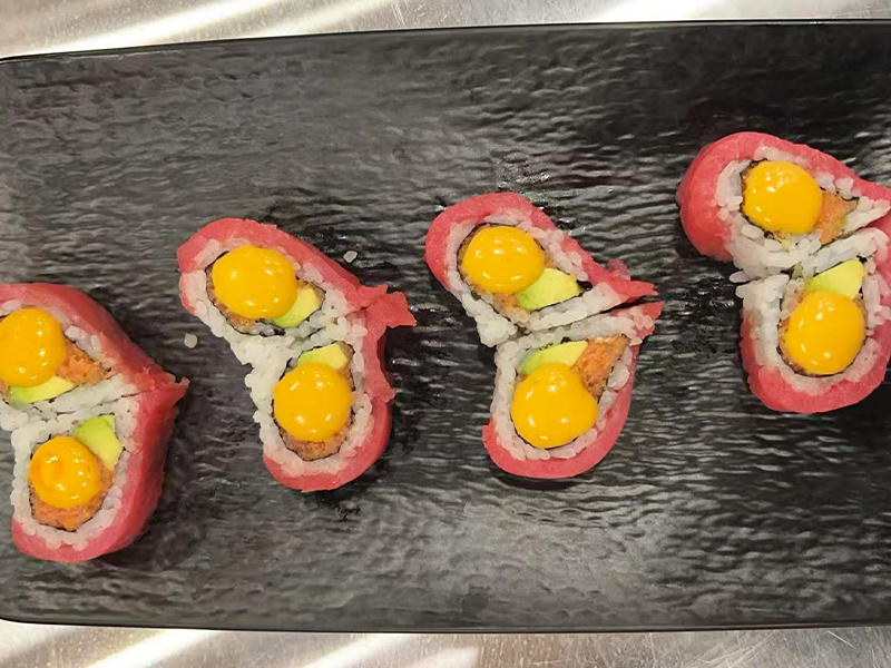 Fresh tuna roll with golden yolk filling at Toyama Sushi Steahouse, a Japanese Restaurant in Dacula