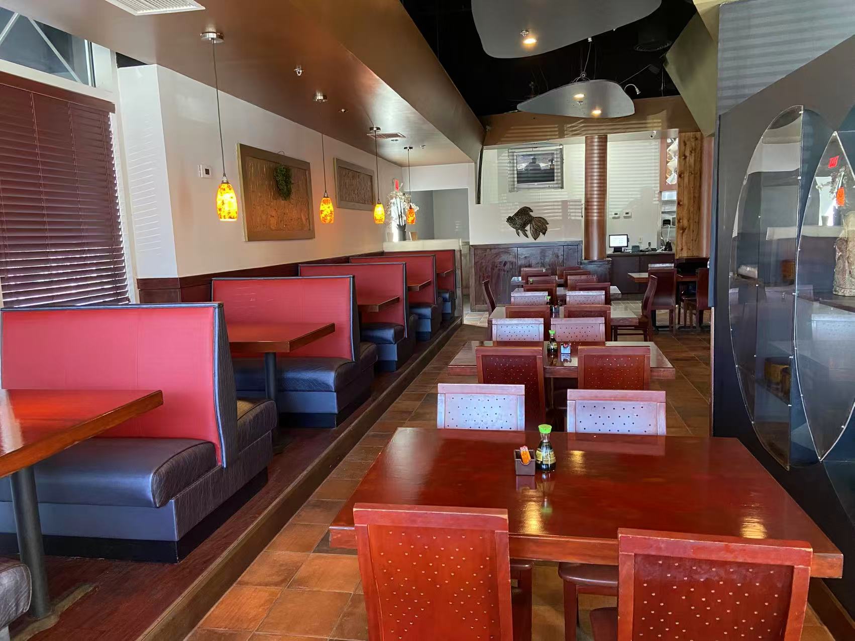 Spacious warm dining space with elegant decor at Toyama Sushi Steahouse, a Japanese Restaurant in Dacula