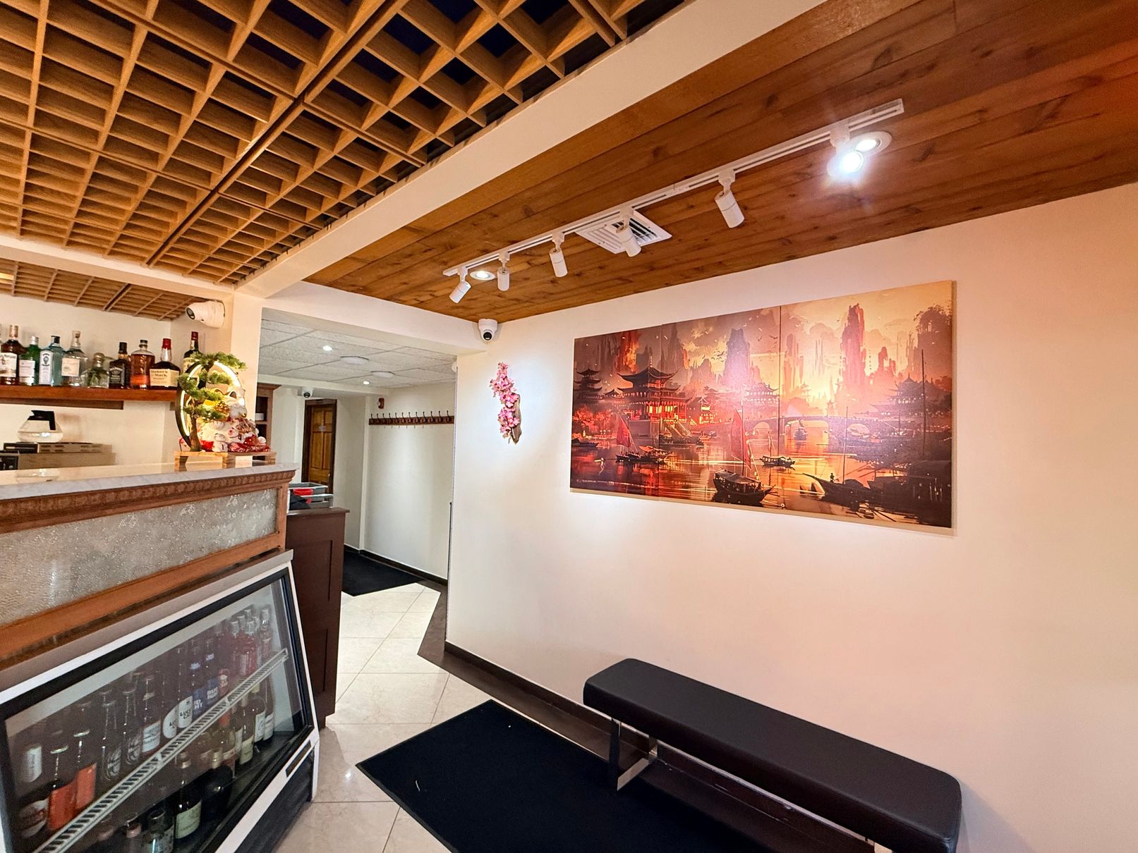 Wall art area with Asian landscape painting at Tsukiyo Sushi Restaurant, a Sushi Restaurant in Smithtown