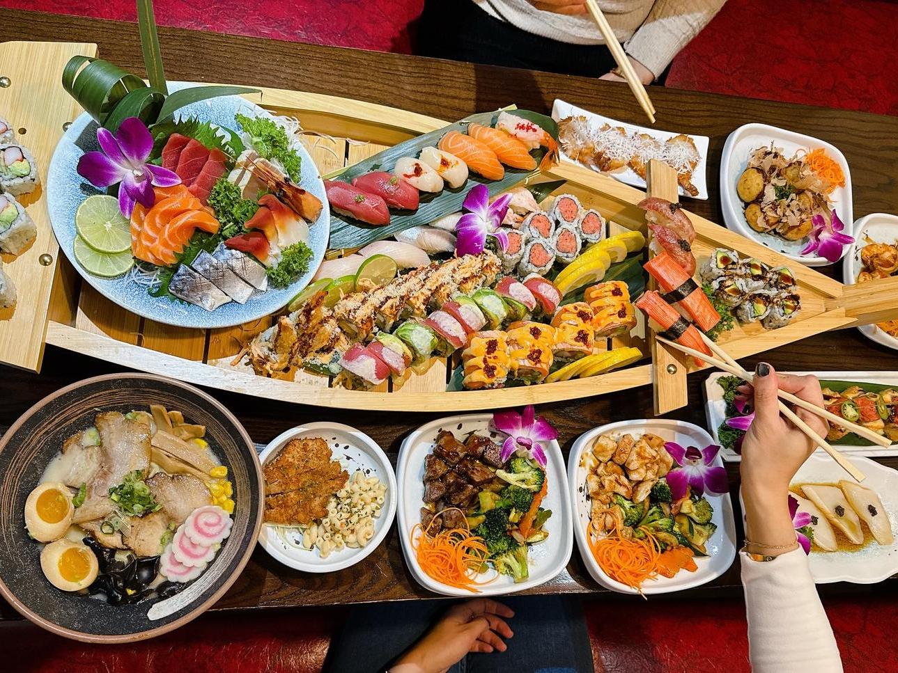 Sushi boat with assorted sushi and sashimi at Tsukiyo Sushi Restaurant, a Sushi Restaurant in Smithtown