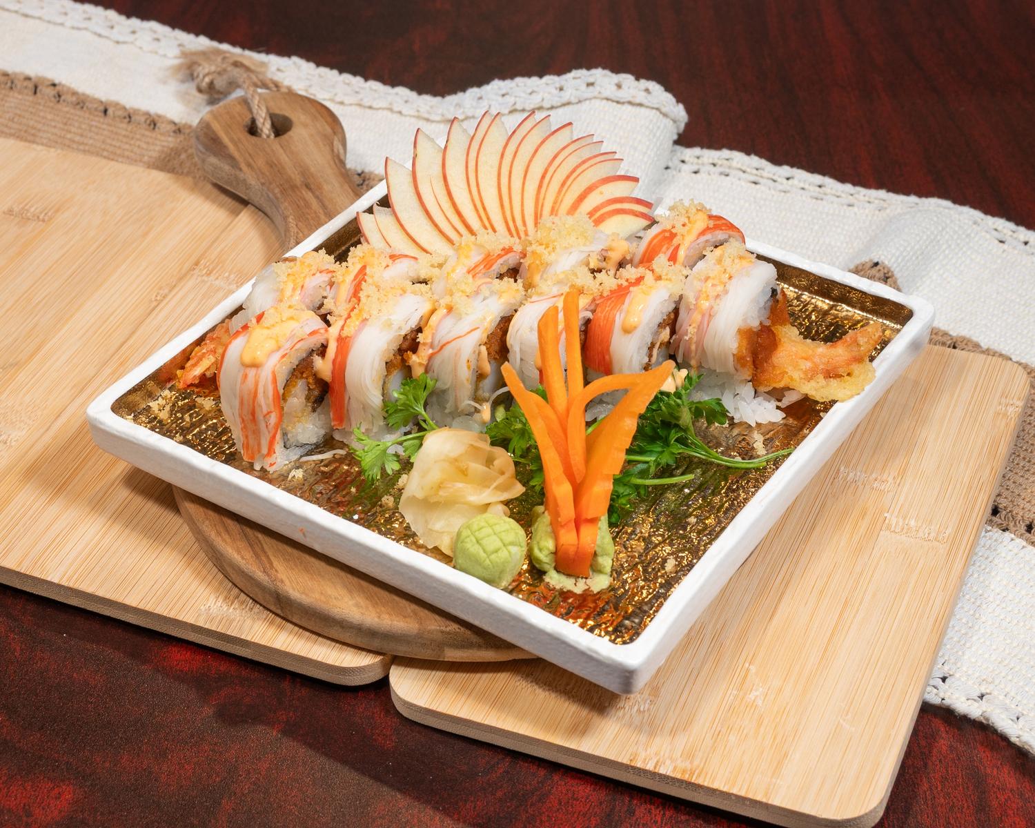Shrimp tempura maki wrapped with imitation crab and crispy topping plus fruit garnish at Ubin Sushi, a Japanese restaurant in Colorado Springs