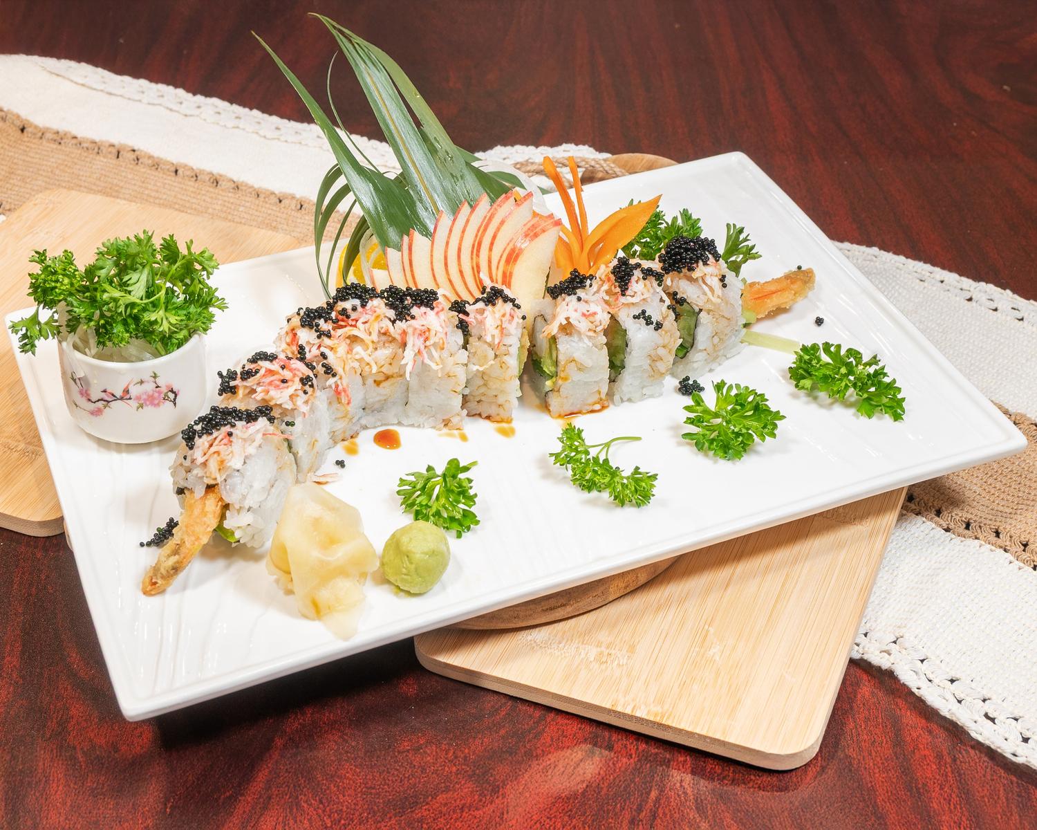 Tempura shrimp sushi roll topped with crab salad, black caviar and fresh parsley garnish at Ubin Sushi, a Japanese restaurant in Colorado Springs