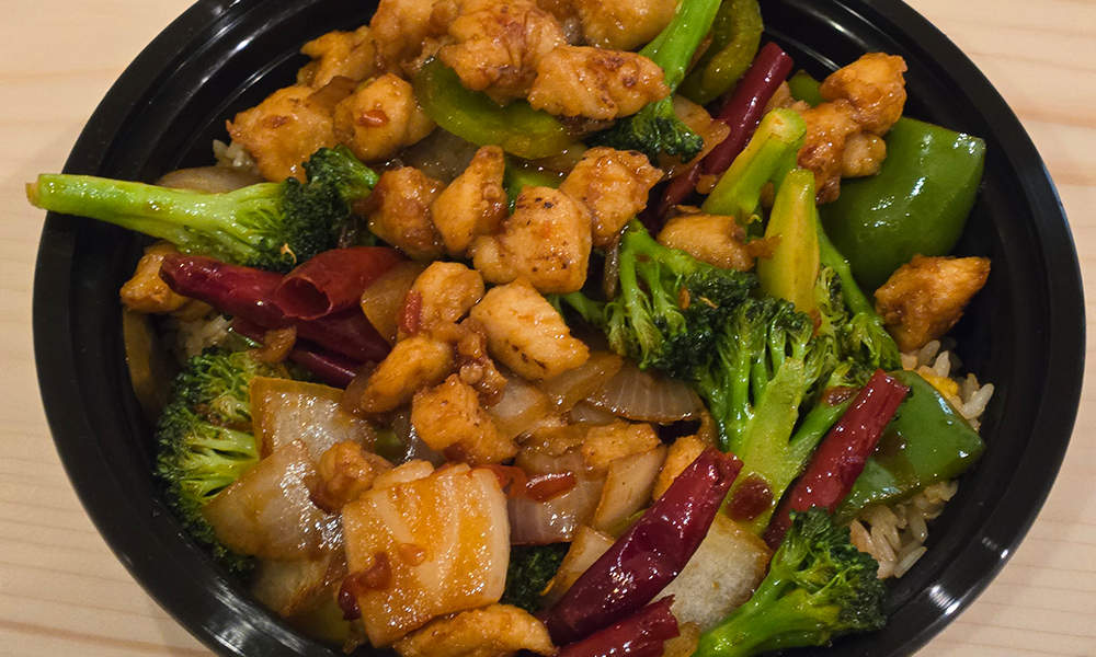 Spicy chicken stir-fry with veggies over rice at U Bowl, a Asian Restaurant in Winston-Salem