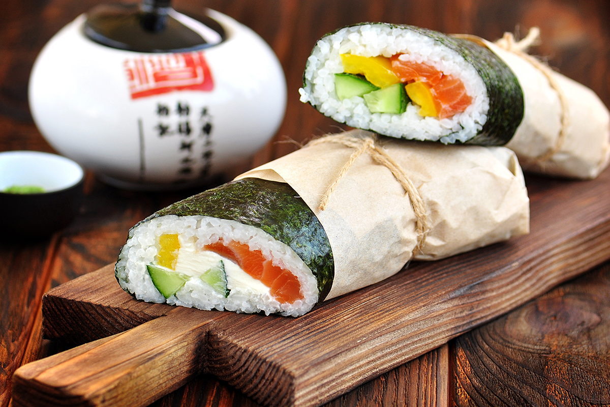 Sushi Burrito with salmon, cucumber, pepper and cream cheese