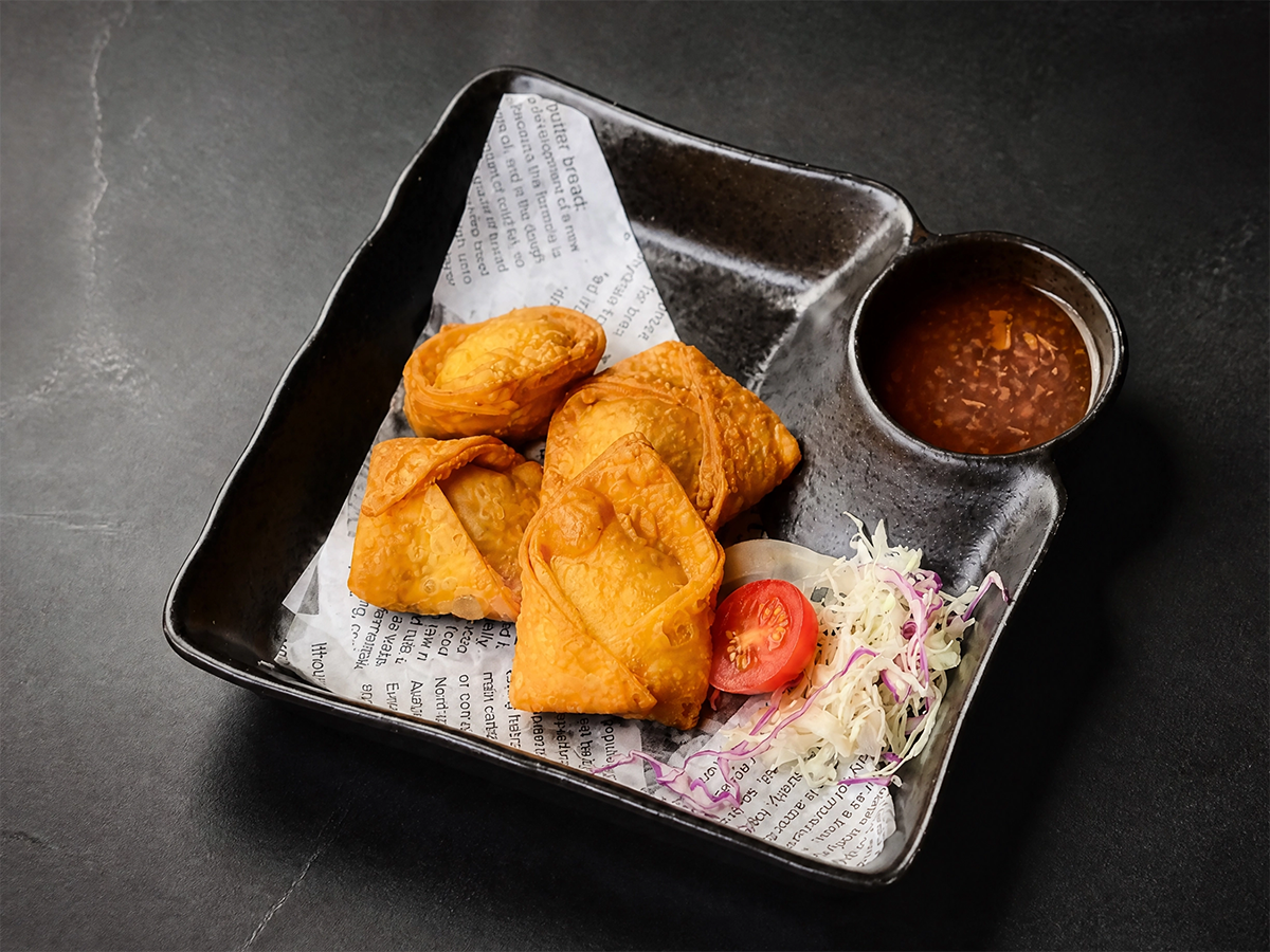 Crispy cheese wontons with dipping sauce