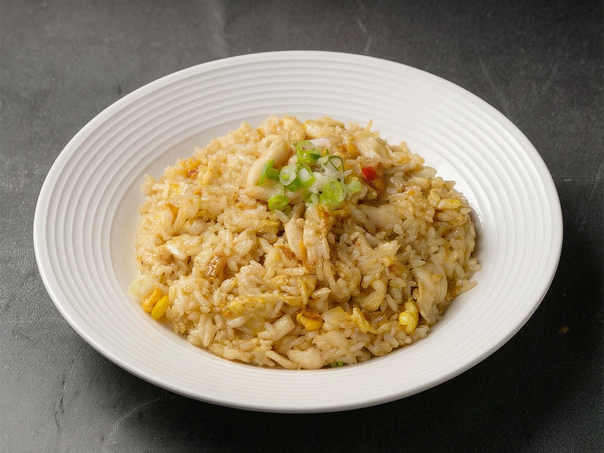Fried rice with chicken, egg, and green onions