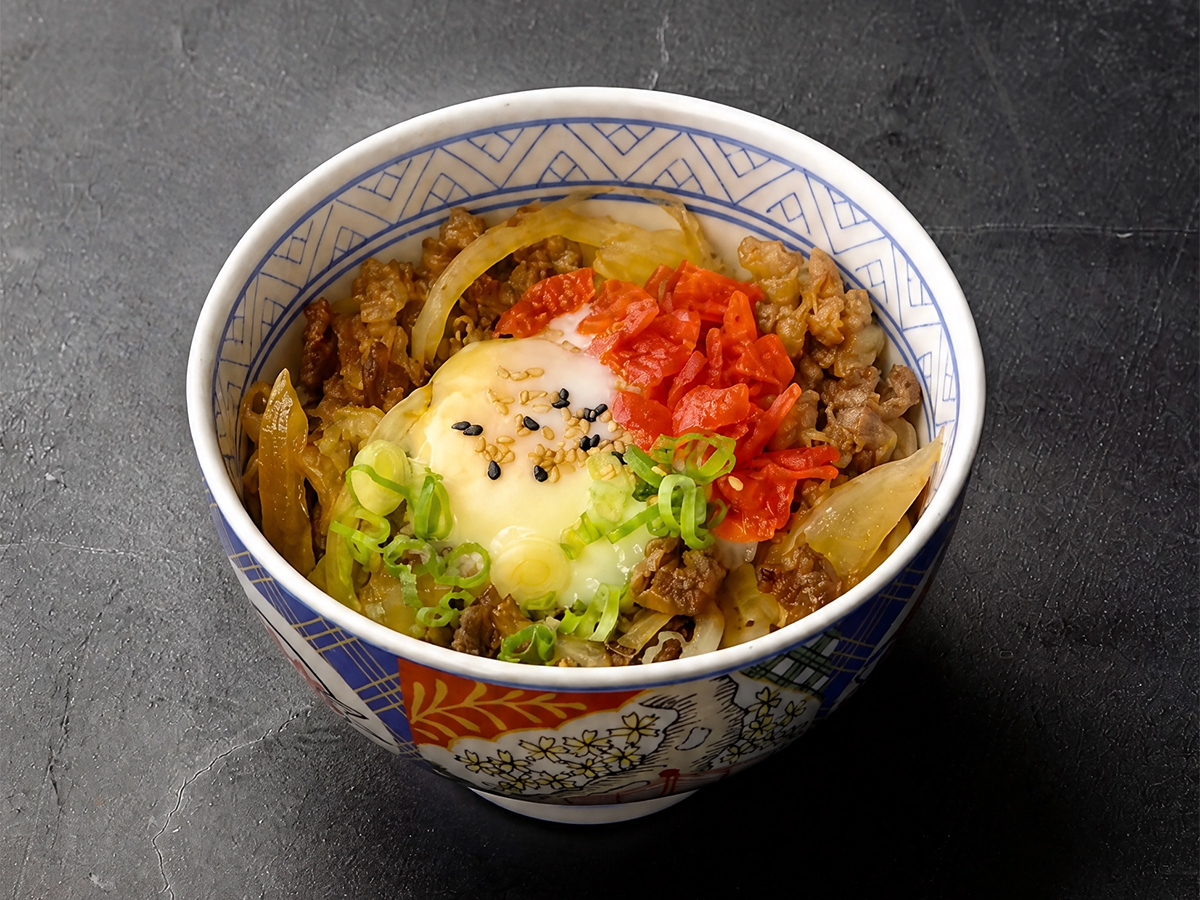 Gyudon beef rice bowl with egg and pickled ginger