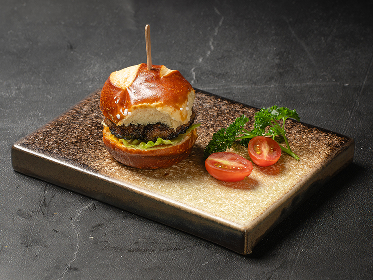 Mini Wagyu beef slider with lettuce and pickles