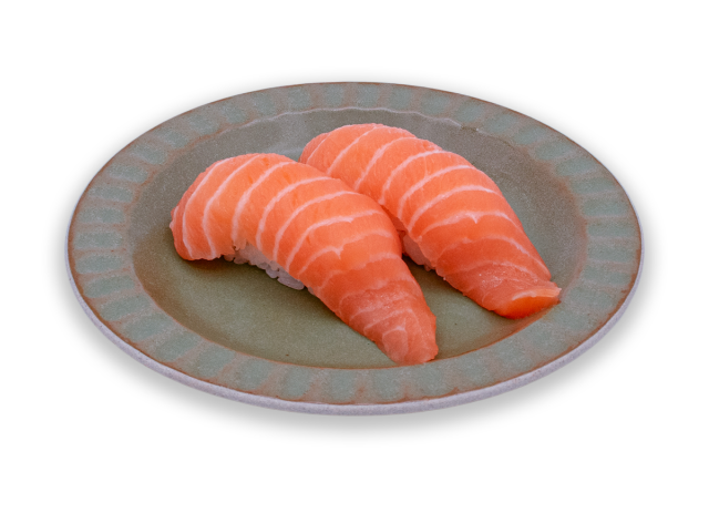 Fresh salmon nigiri served on a ceramic plate