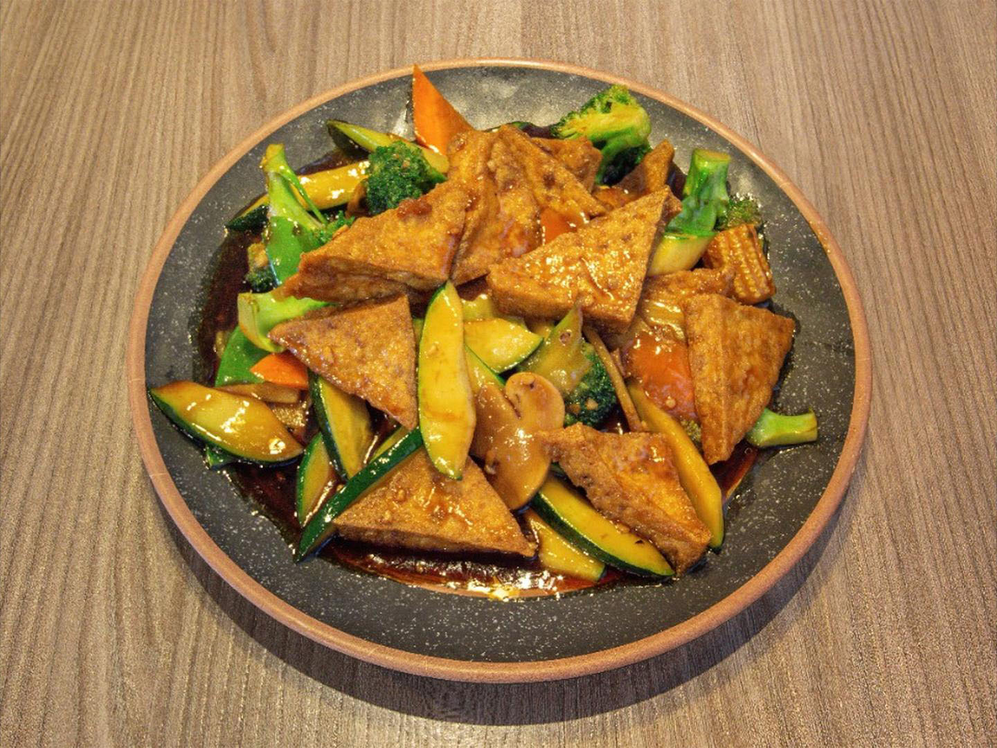 Crispy tofu with veggies & savory sauce at Uncle Qwik Chinese & Dumpling Restaurant, a Chinese Restaurant in Scottsdale