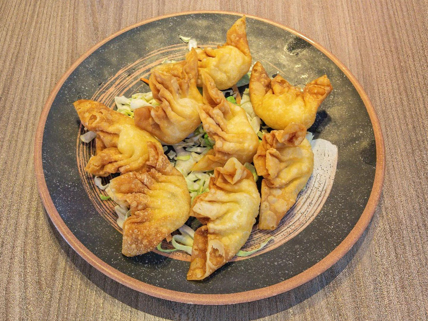 Crispy wontons stuffed with crab filling at Uncle Qwik Chinese & Dumpling Restaurant, a Chinese Restaurant in Scottsdale