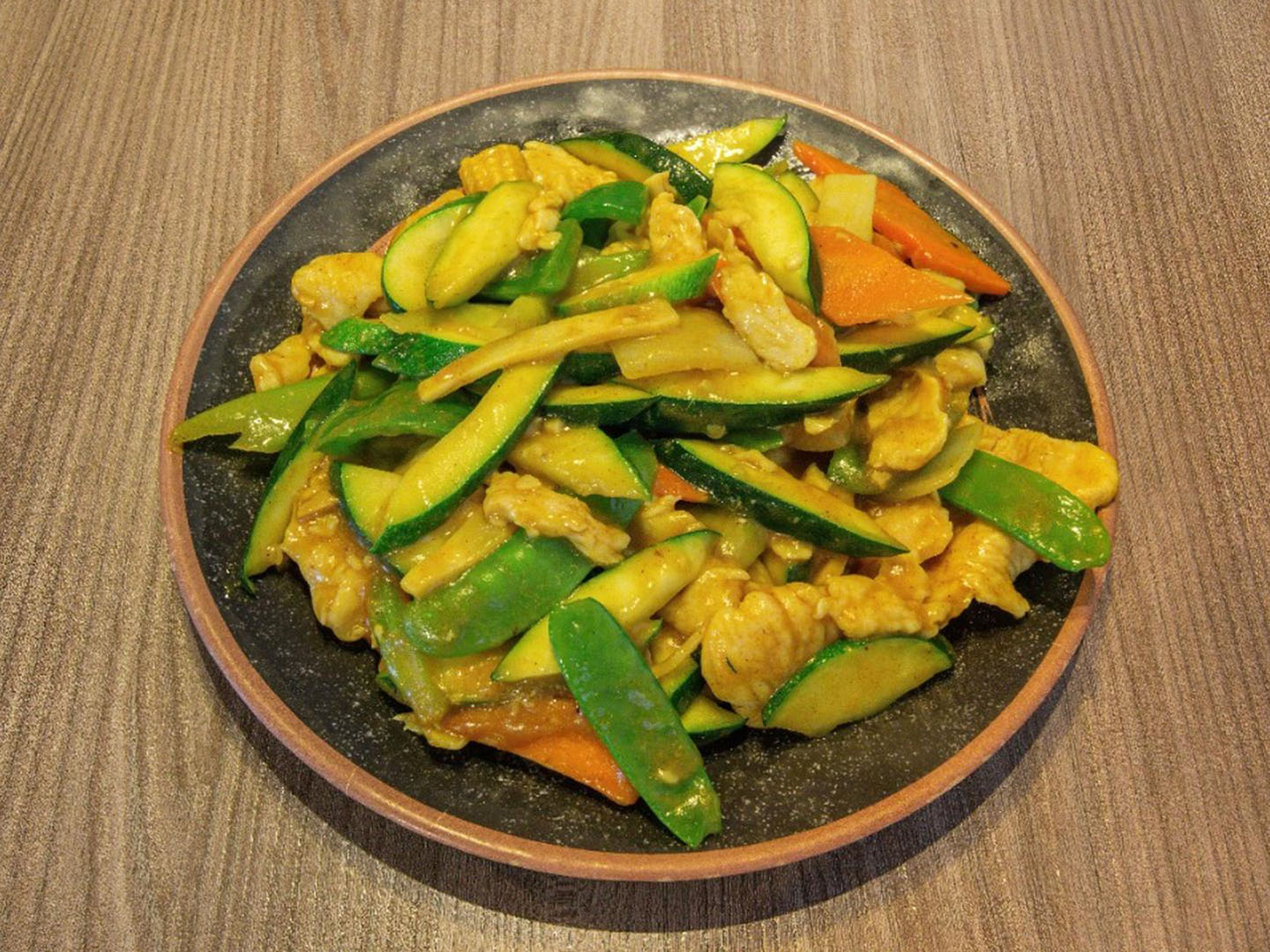 Tender chicken with veggies in curry sauce at Uncle Qwik Chinese & Dumpling Restaurant, a Chinese Restaurant in Scottsdale