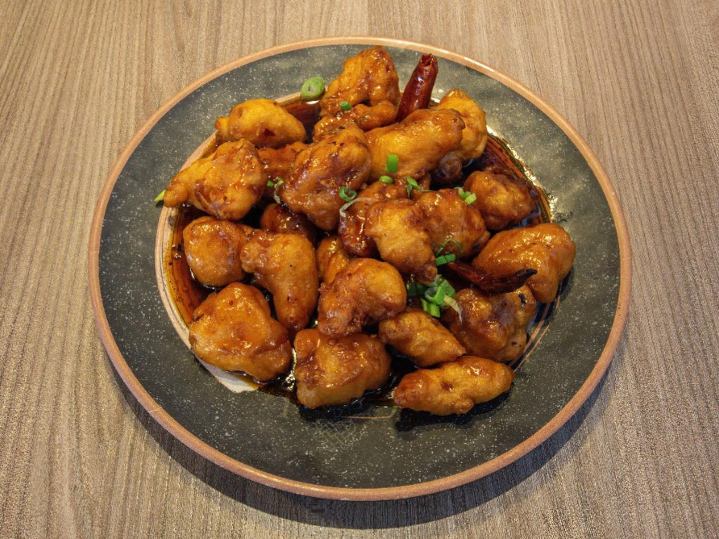 Crispy chicken in sweet-spicy sauce at Uncle Qwik Chinese & Dumpling Restaurant, a Chinese Restaurant in Scottsdale