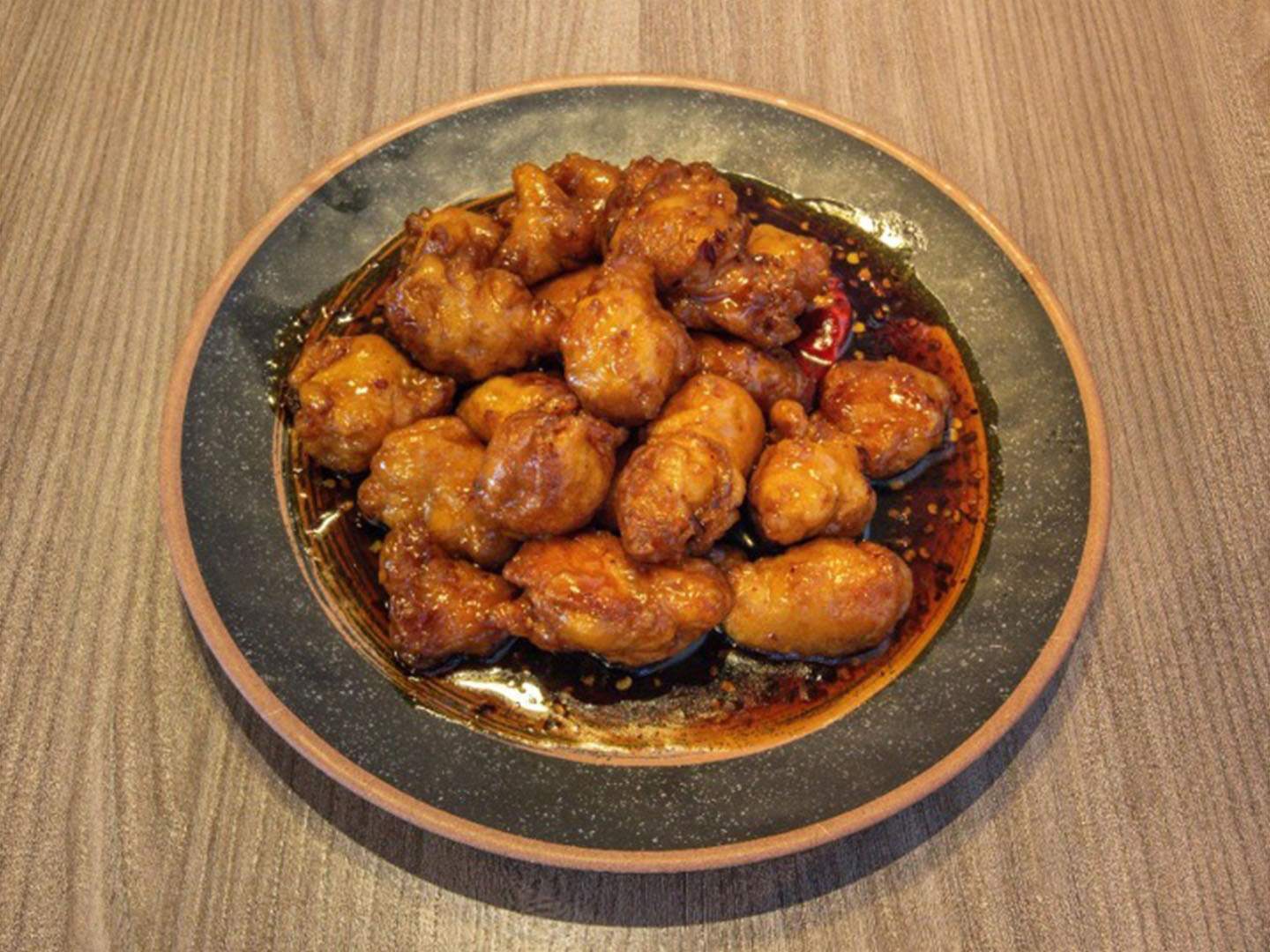 Crispy chicken in sweet-orange sauce at Uncle Qwik Chinese & Dumpling Restaurant, a Chinese Restaurant in Scottsdale