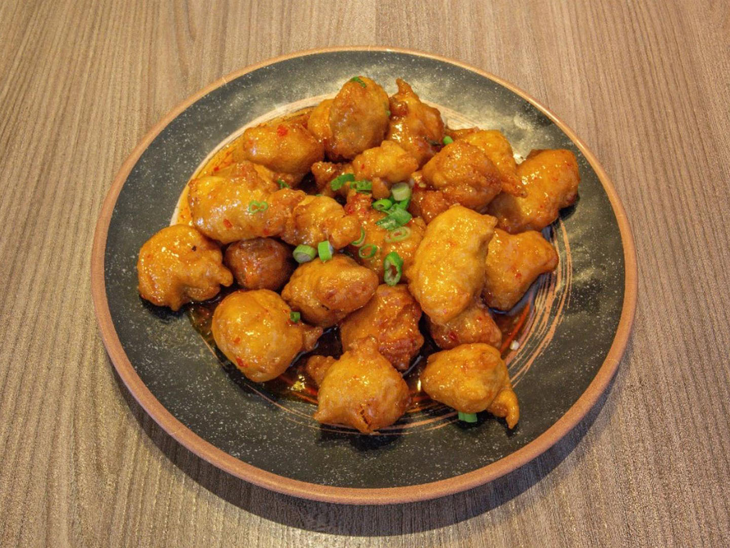 Crispy chicken in sweet-chili sauce at Uncle Qwik Chinese & Dumpling Restaurant, a Chinese Restaurant in Scottsdale