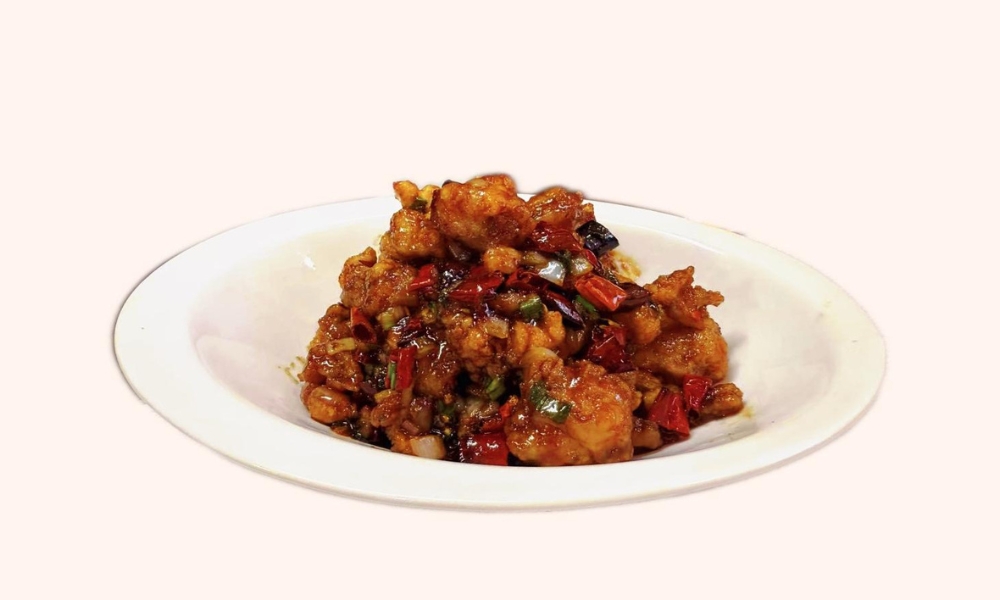 Spicy Kung Pao chicken with chili peppers at Uncle Sun, a Chinese Restaurant in Eugene