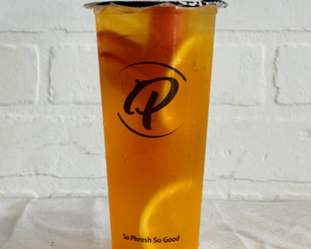 Mixed fruit iced tea with fresh fruit chunks at Uniboil Phresh Teas Co, a Hot Pot Restaurant in Goleta.