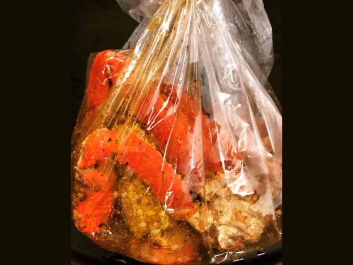Crab boil seafood mix in a steaming bag at Utica Crab & Boil, a Seafood Restaurant in Utica