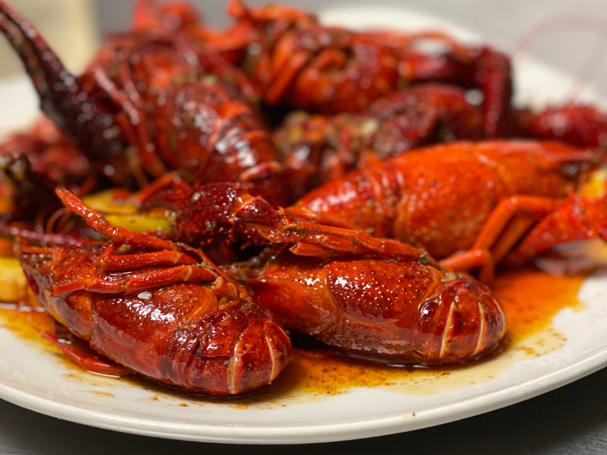 Spicy boiled crawfish on a plate at Utica Crab & Boil, a Seafood Restaurant in Utica