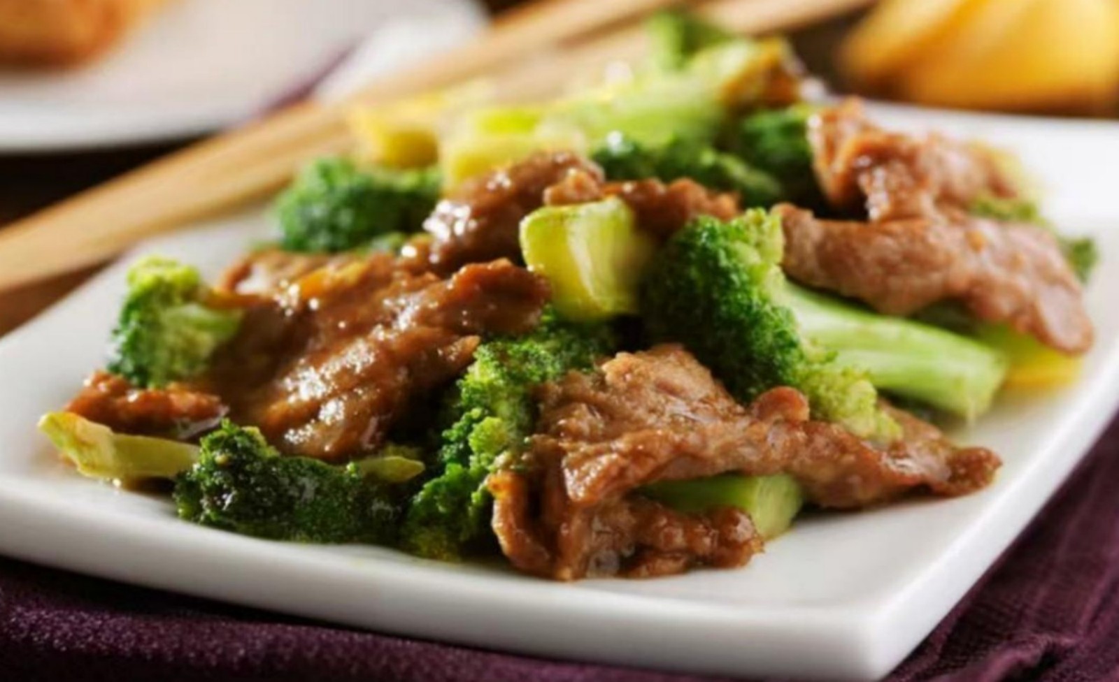 Stir-fried beef with broccoli in savory brown sauce.