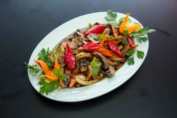 Wang’s-Chinese-Cuisine-Chinese-restaurant-Mushroom-Vegetable-Stir-Fry-Cathedral-City Stir - fried mushrooms with assorted colorful vegetables at Wang's Chinese Cuisine, a Chinese restaurant in Cathedral City