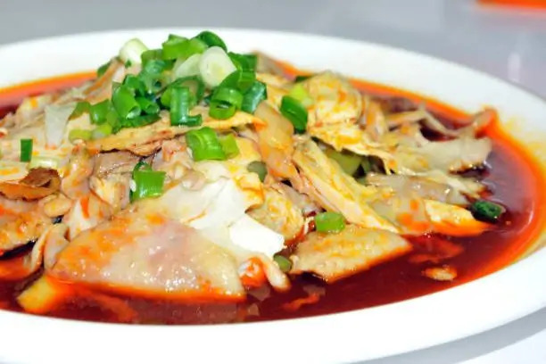 Wang’s-Chinese-Cuisine-Chinese-restaurant-Spicy-Shredded-Chicken-Cathedral-City Shredded chicken in spicy red oil, topped with scallions at Wang's Chinese Cuisine, a Chinese restaurant in Cathedral City