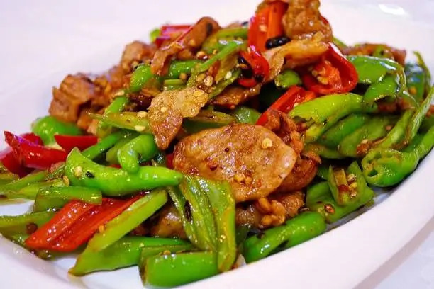 Wang’s-Chinese-Cuisine-Chinese-restaurant-Double-Pepper-Pork-Cathedral-City Pork stir - fried with green and red chilies at Wang's Chinese Cuisine, a Chinese restaurant in Cathedral City
