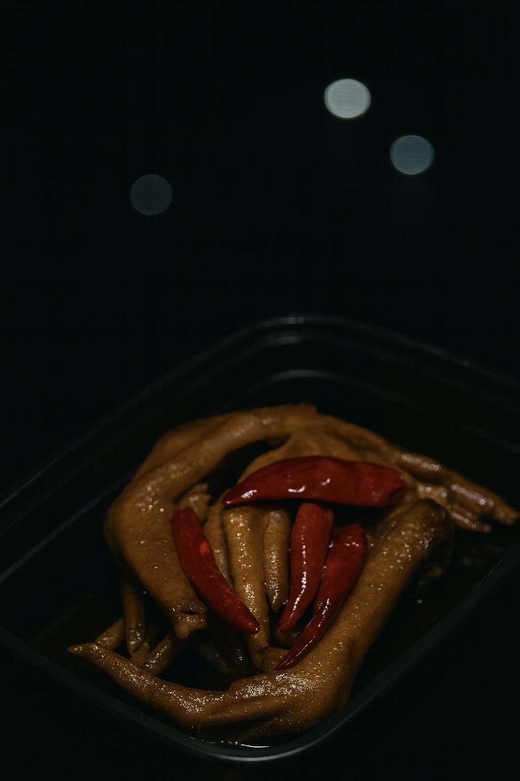 Spicy Braised Duck Feet at Warrior Duck LateNight Plaza，a Chinese Restaurant in Seattle