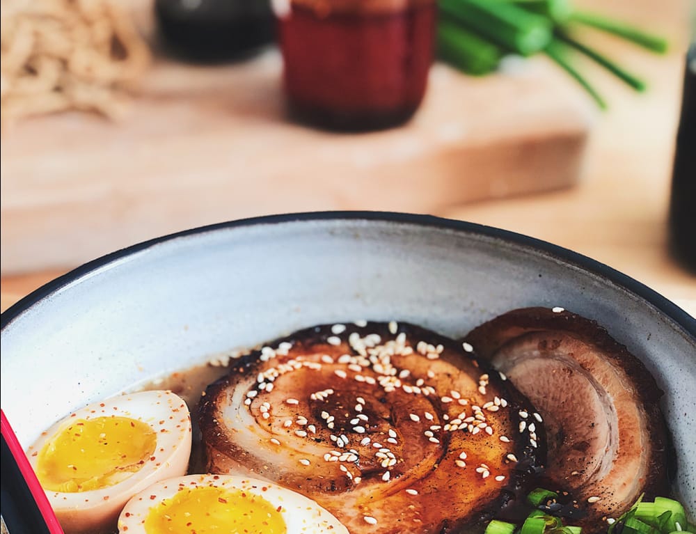 Japanese char siu ramen in a bowl, with onsen eggs, char siu and sesame