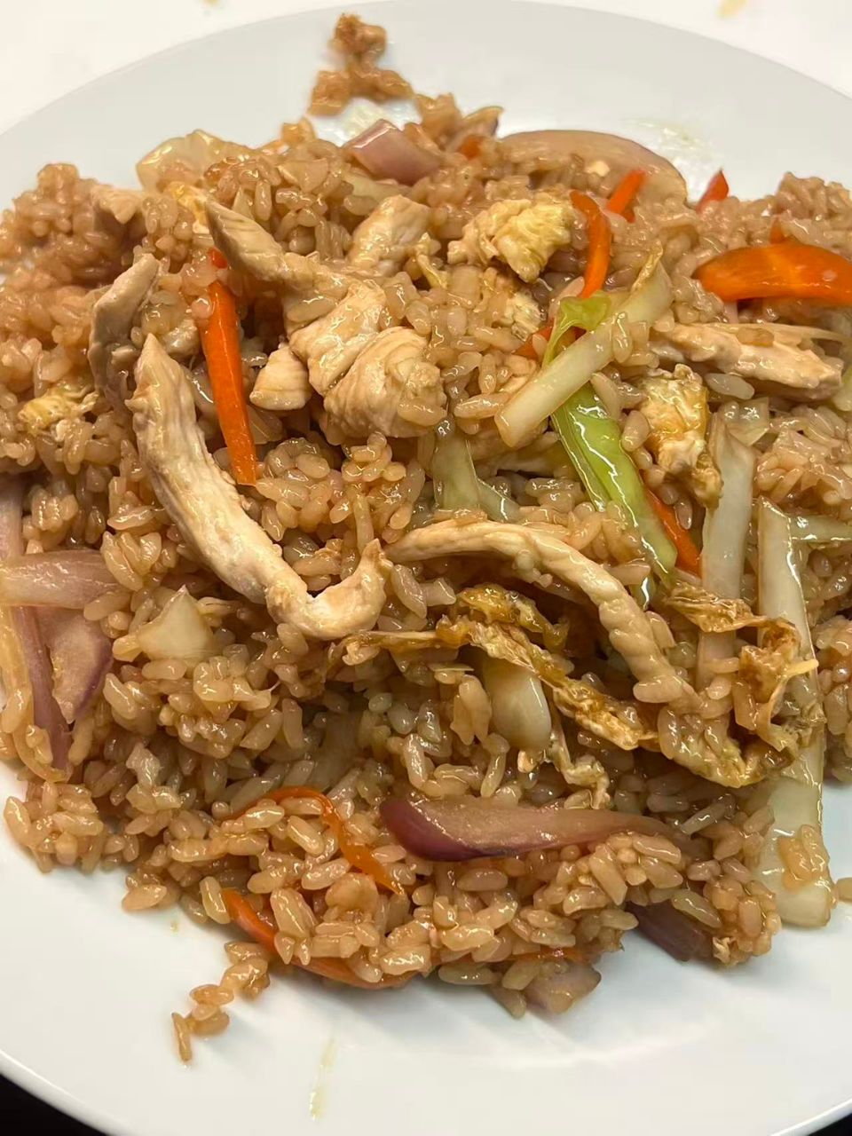 Savory chicken fried rice with eggs and vegetables at Wei Sushi&Ramen, a Japanese Restaurant in Cobleskill