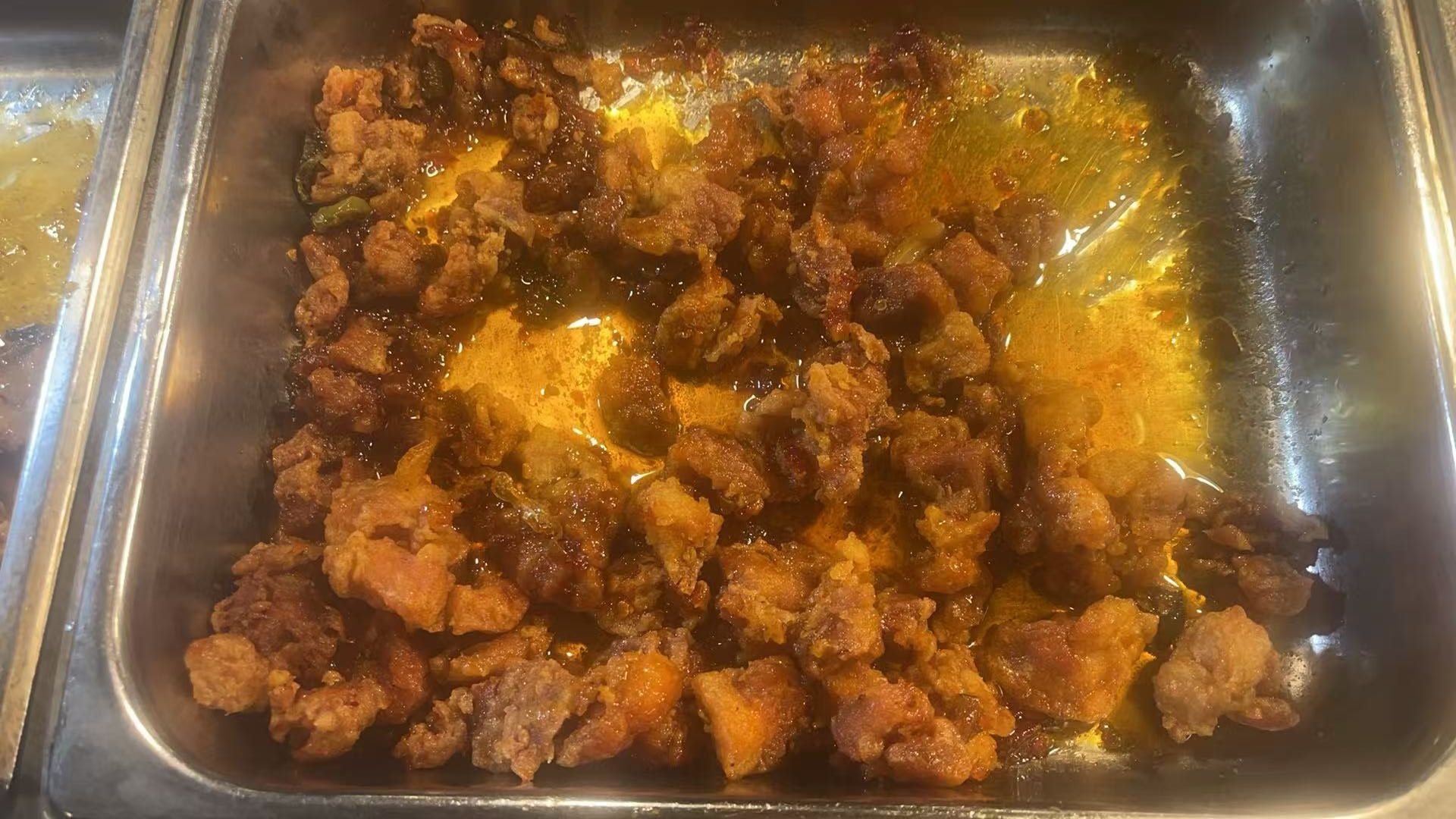 Fried pork at Wengs of pekin, a Buffet Restaurant in Pekin