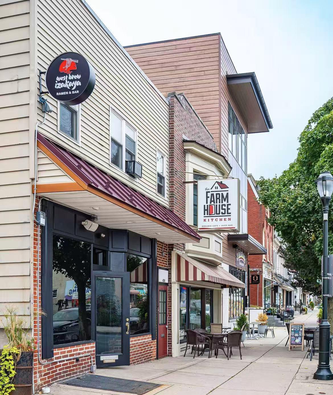 Exterior view of West Brew Izakaya with neighboring shops at West Brew Izakaya, a Japanese Restaurant in West Reading