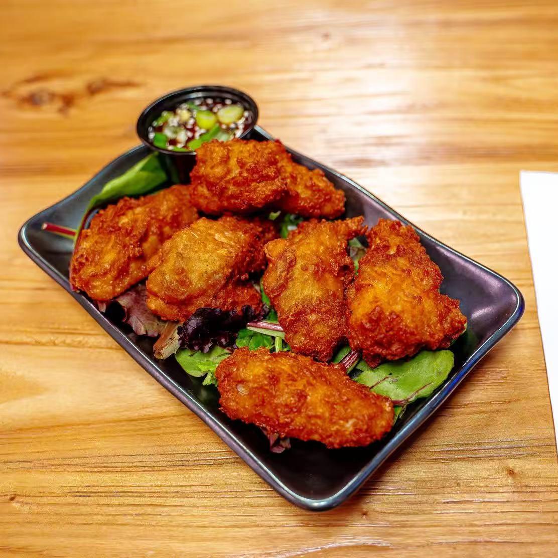 West-Brew-Izakaya-Japanese-Restaurant-Karaage-Wings-West-Reading Crispy fried chicken wings with dipping sauce at West Brew Izakaya, a Japanese Restaurant in West Reading