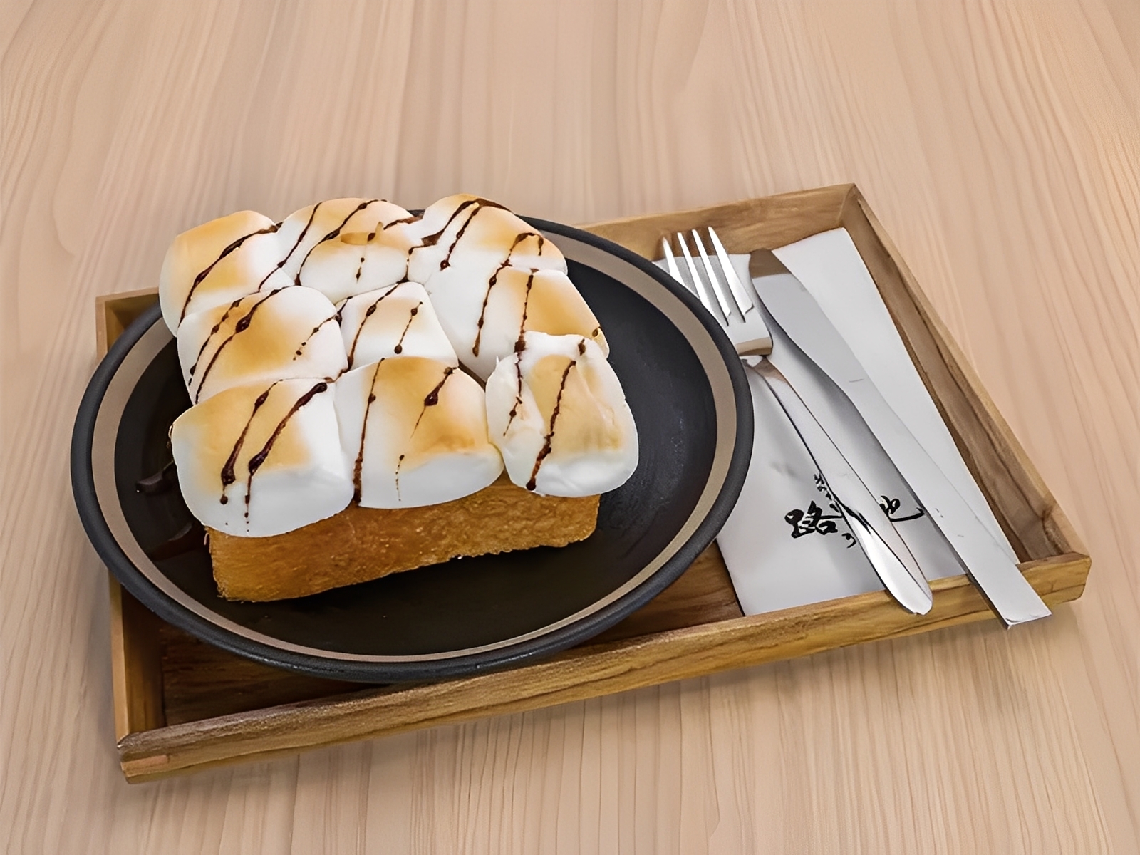 Jin-Foodie-New-American-Restaurant-Toast-with-Toasted-Marshmallows-West-Covina Toast topped with toasted marshmallows and chocolate drizzle at Jin Foodie, a New American Restaurant in West Covina