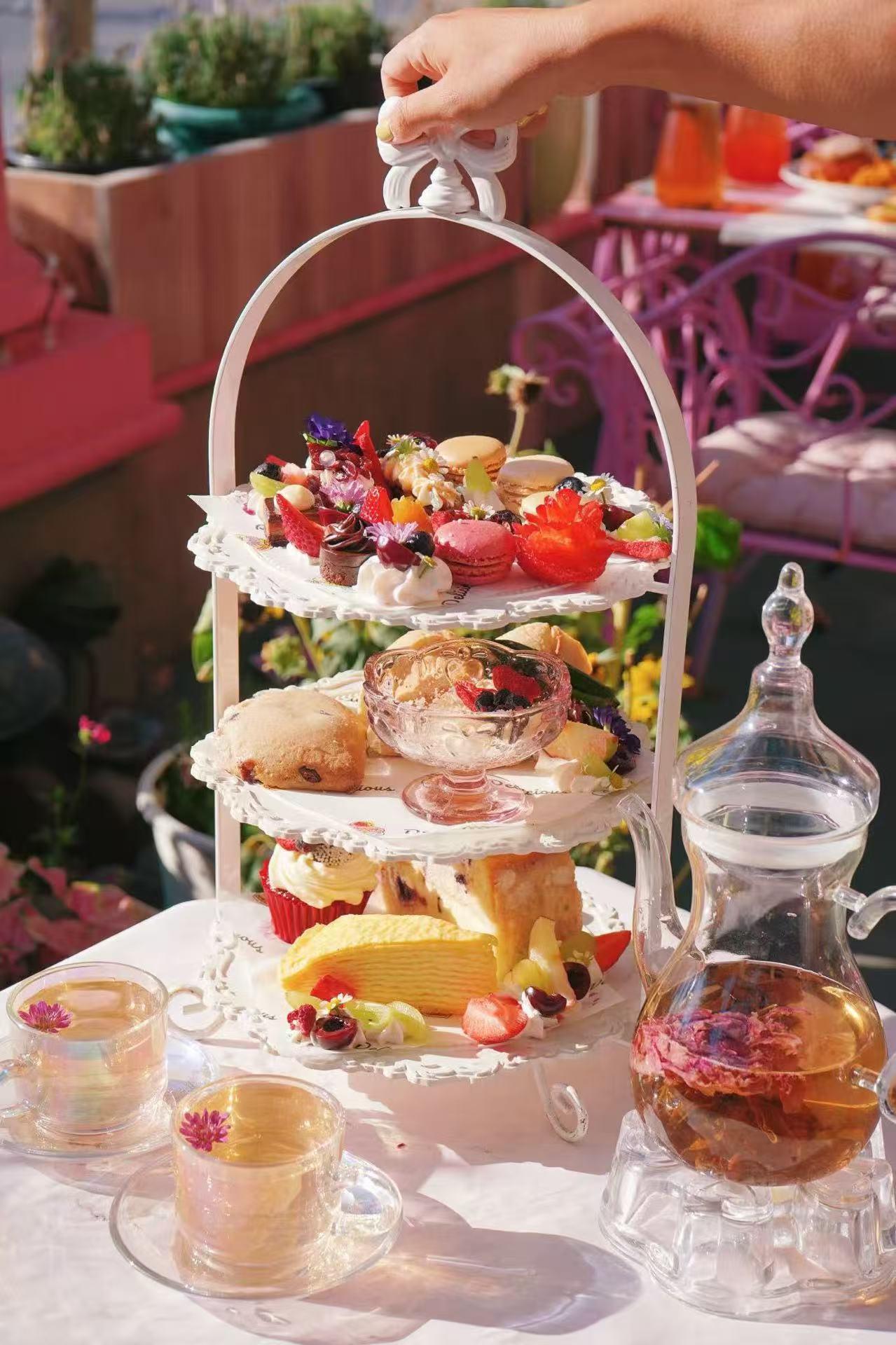 Jin-Foodie-New-American-Restaurant-Afternoon-Tea-Set-West-Covina An elegant afternoon tea set with pastries and floral - infused tea at Jin Foodie, a New American Restaurant in West Covina