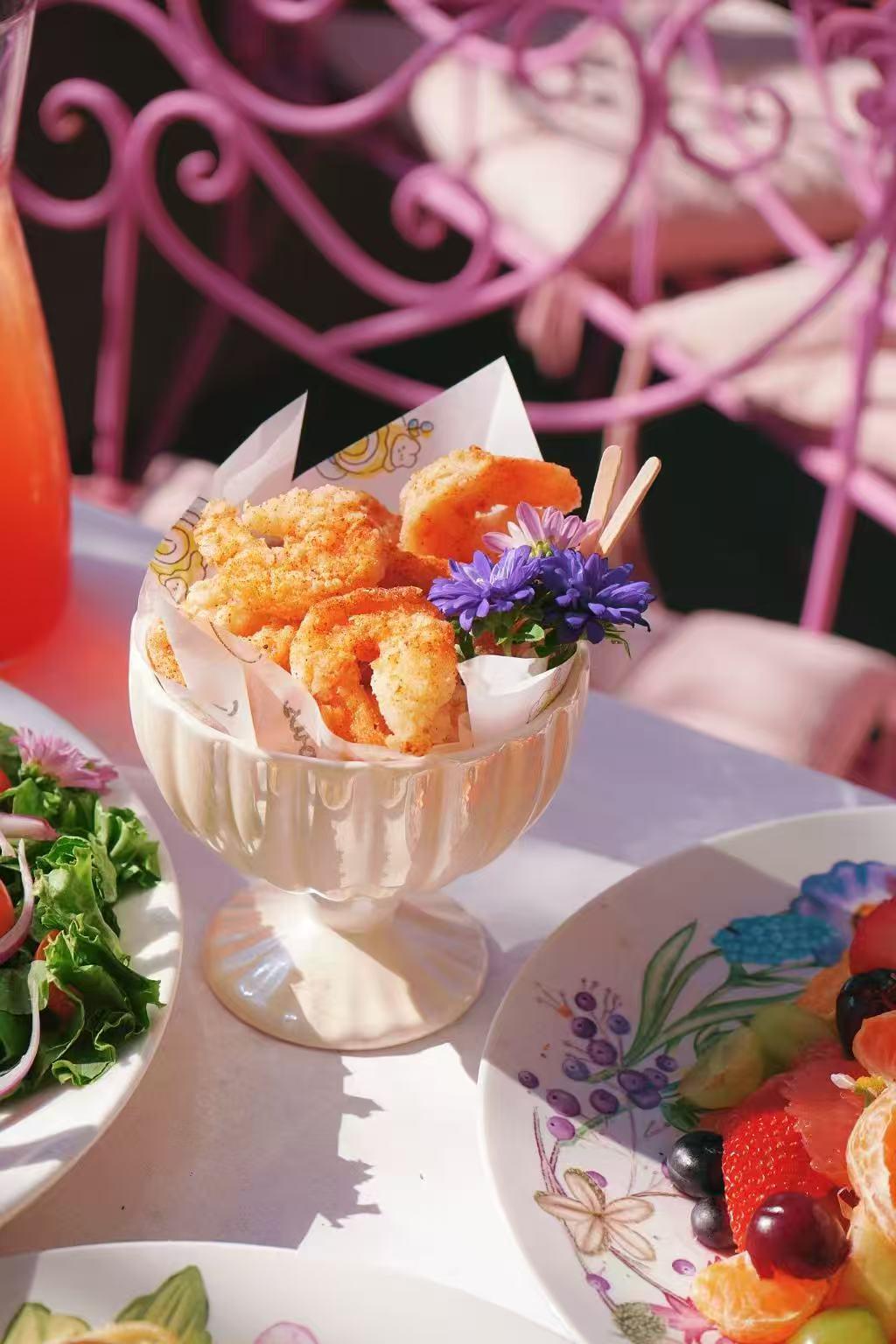 Jin-Foodie-New-American-Restaurant-Fried-Shrimp-West-Covina Fried shrimp presented in a cup with flower garnish at Jin Foodie, a New American Restaurant in West Covina