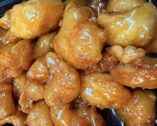Honey-glazed chicken pieces at Wild Ginger Asian Bistro, a Asian restaurant in Gilbert