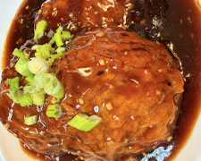Braised meat patty in brown sauce with scallions at Wild Ginger Asian Bistro, a Asian restaurant in Gilbert