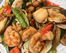 Seafood stir-fry with mussels, shrimp and veggies at Wild Ginger Asian Bistro, a Asian restaurant in Gilbert