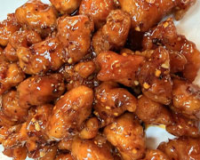 Spicy garlic chicken with sesame seeds at Wild Ginger Asian Bistro, a Asian restaurant in Gilbert