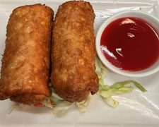 Fried spring rolls with red dipping sauce at Wild Ginger Asian Bistro, a Asian restaurant in Gilbert