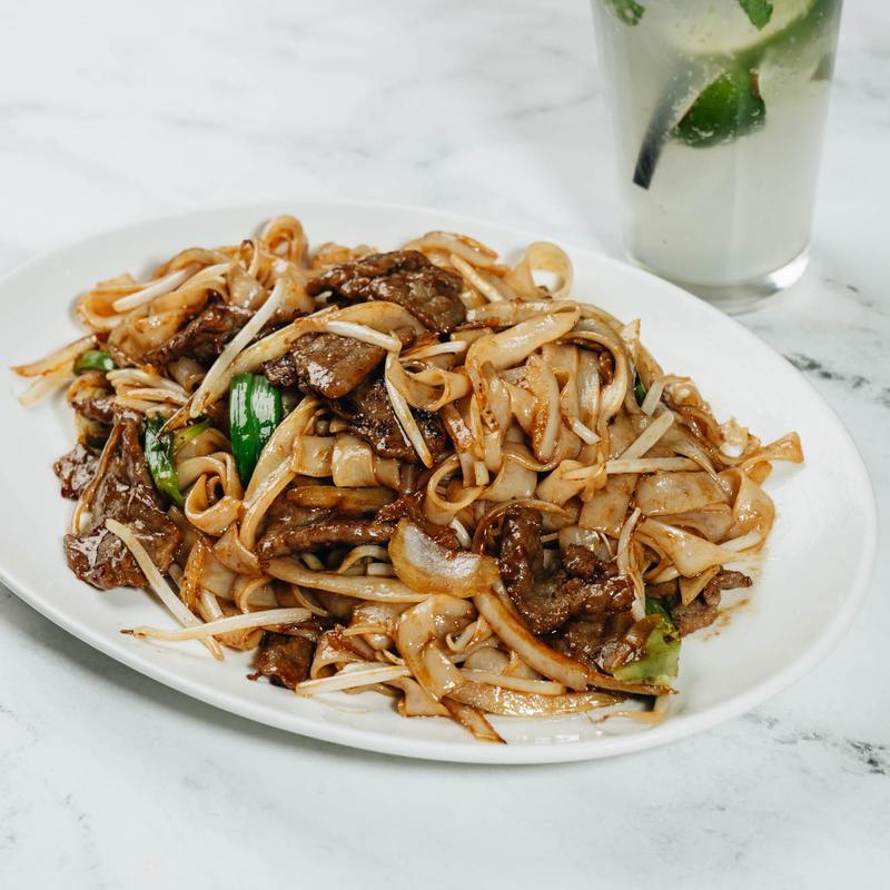 Beef chow fun stir-fried rice noodles with bean sprouts